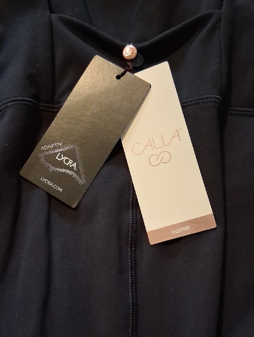 CALIA by Carrie Underwood Black Athletic Romper.
